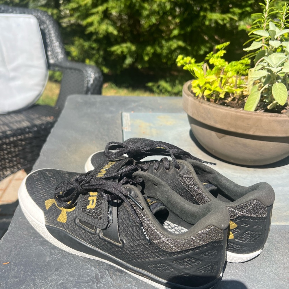 Under Armour Black and Gold track shoes (shotput-throws)